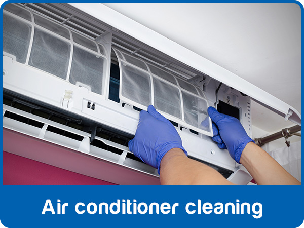 Pressure washing a disassembled wall-mounted air conditioner - Air 2 Inc.
