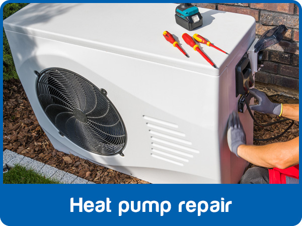 Air 2 technician diagnosing a wall-mounted heat pump